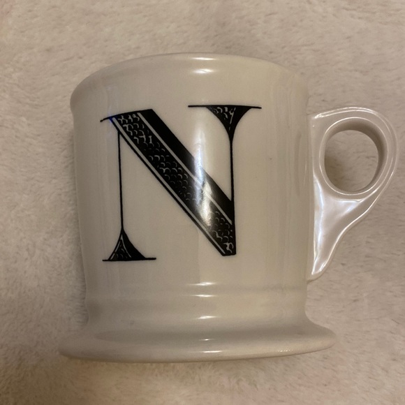 Black and white decorative mug with the capital letter N stamped on the bottom - Picture 2 of 12